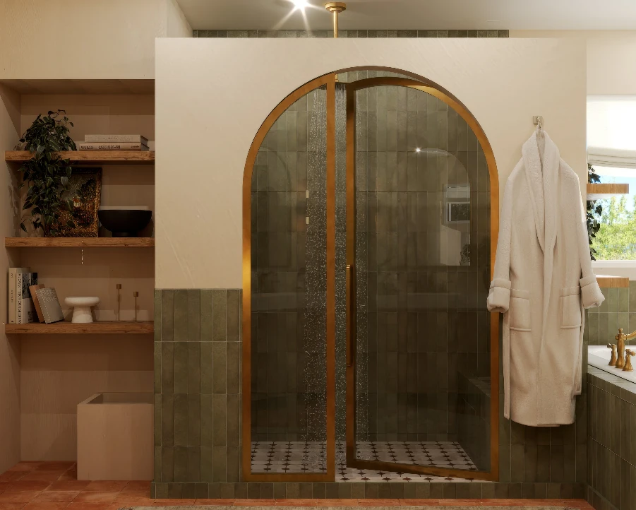 Arched brass shower door framed in olive zellige tile next to white oak open shelving and a hanging cotton robe