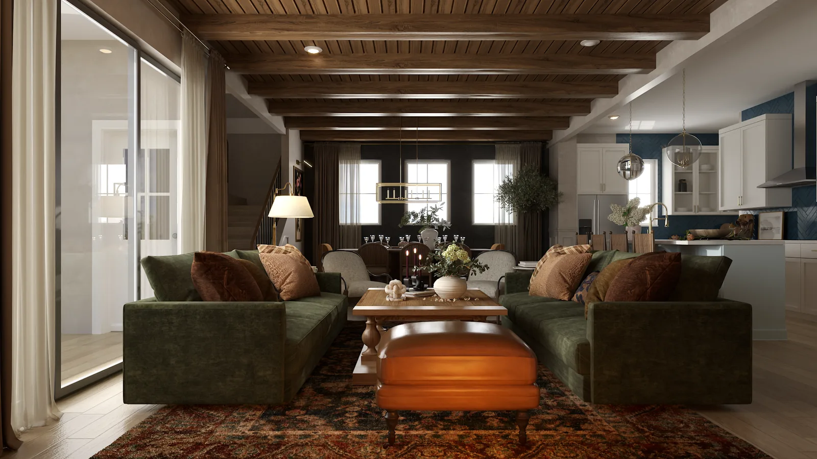 Open living-dining room with walnut beams, green sectional, cognac leather ottoman, and brass chandelier
