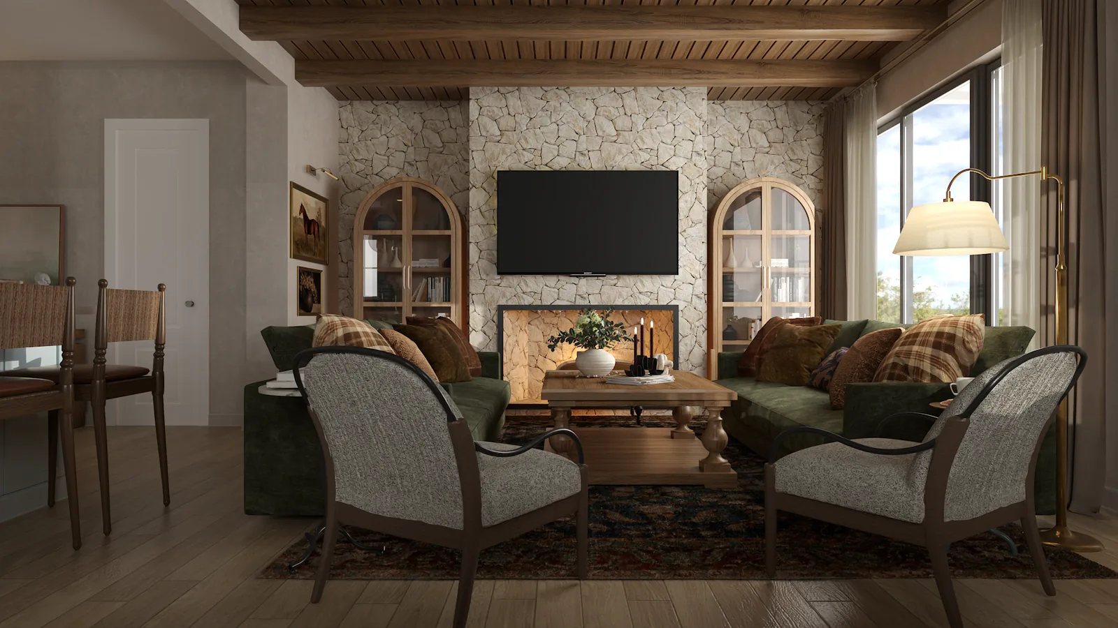 Transitional living room with stone fireplace, green velvet sectional, woven accent chairs, and walnut beams