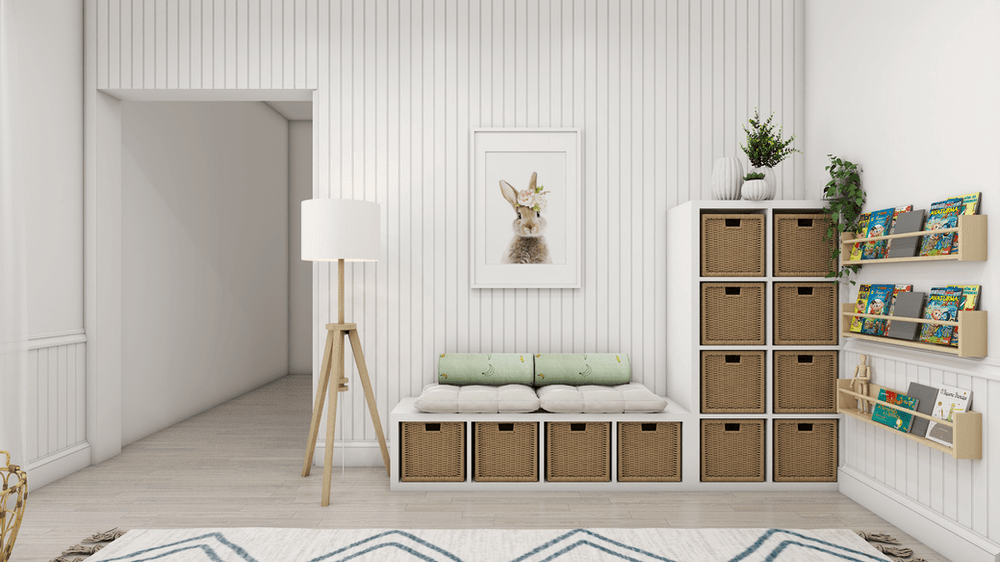 Well-organized and aesthetically pleasing room, likely designed for children's use or a cozy reading nook. The walls are adorned with vertical white paneling, creating a clean and bright ambiance.