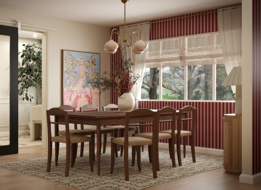 Dining room after with burgundy pinstripe wallpaper, a walnut table, and woven cane chairs