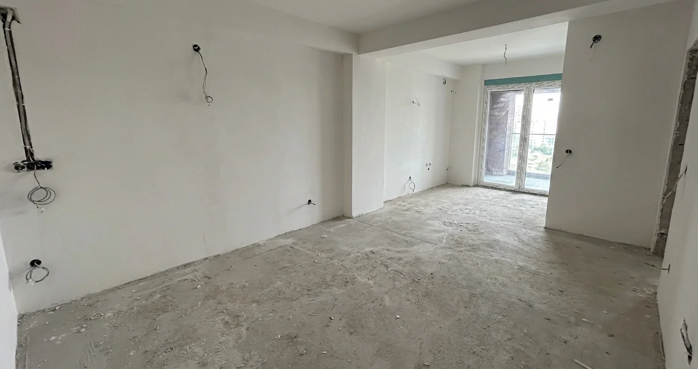 Living room with matching furniture set before renovation