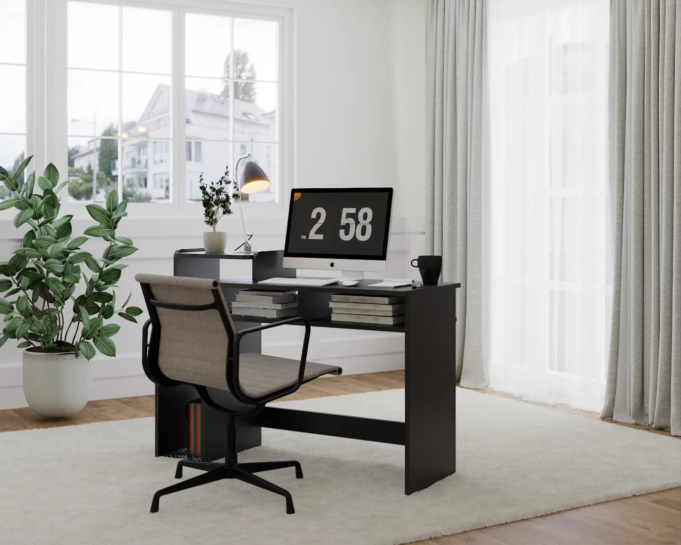Compact black solid-panel desk with open shelf underneath in a staged office