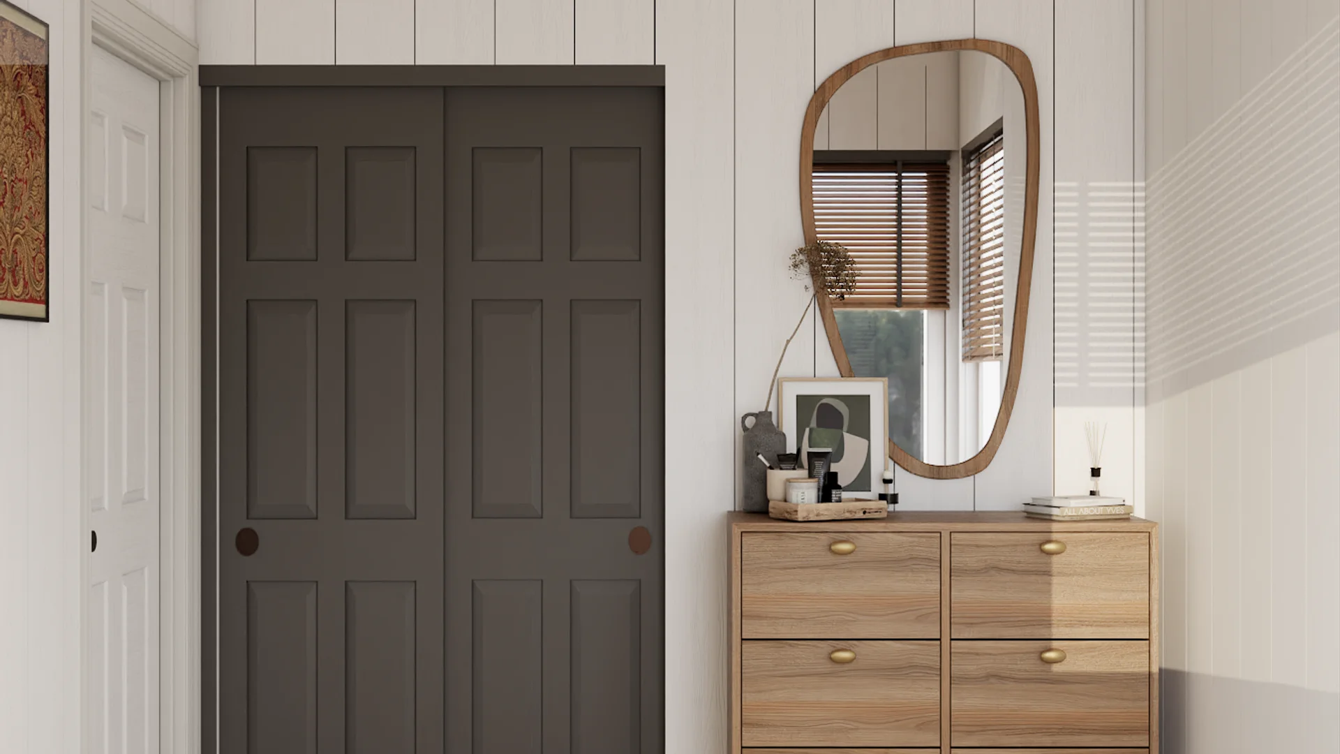 Entryway with walnut dresser, brass knobs, organic wood mirror, and charcoal closet doors