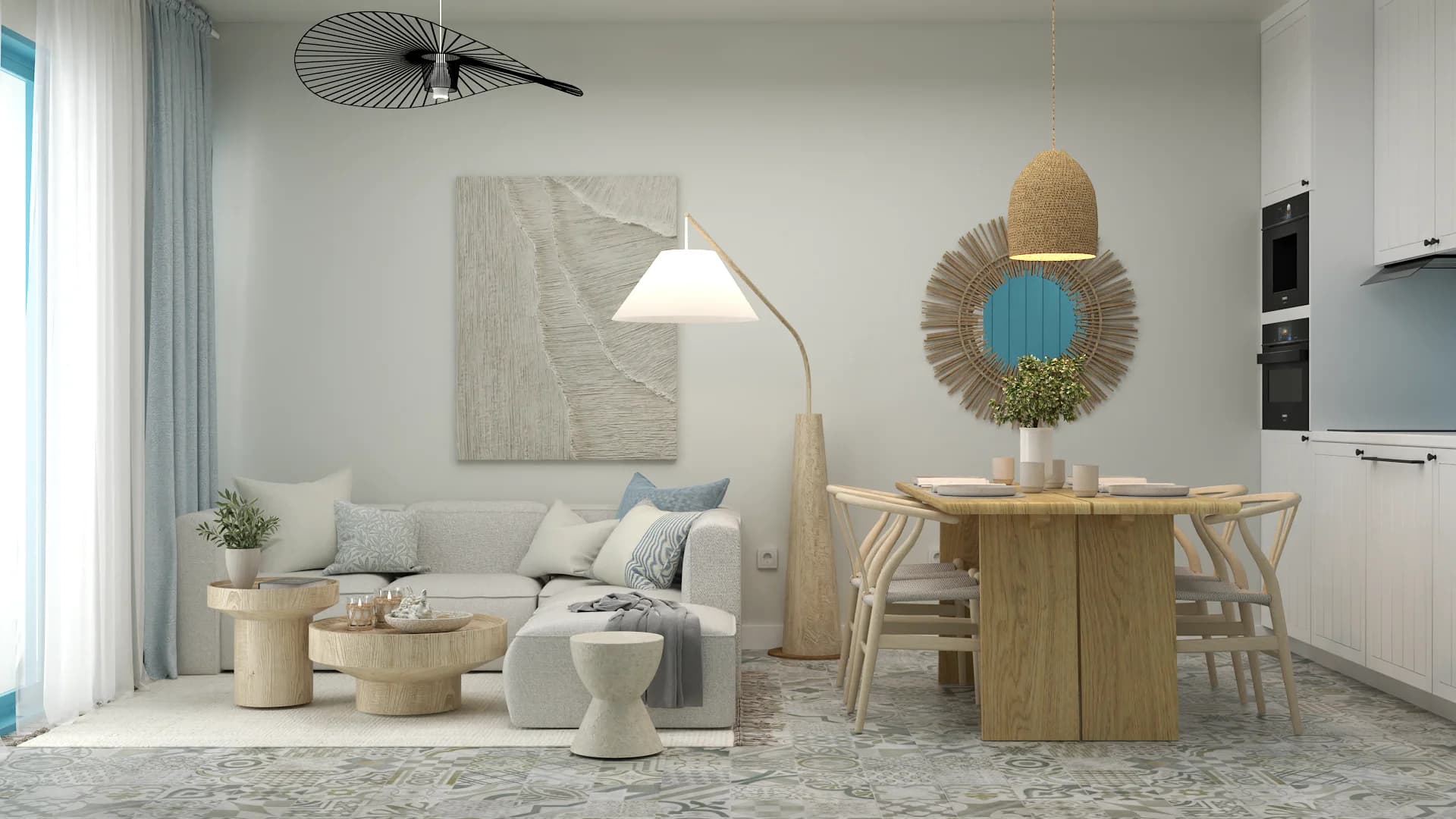 Open-plan coastal apartment with pale aqua curtains, oak dining table, woven pendant, and patterned cement tile floor