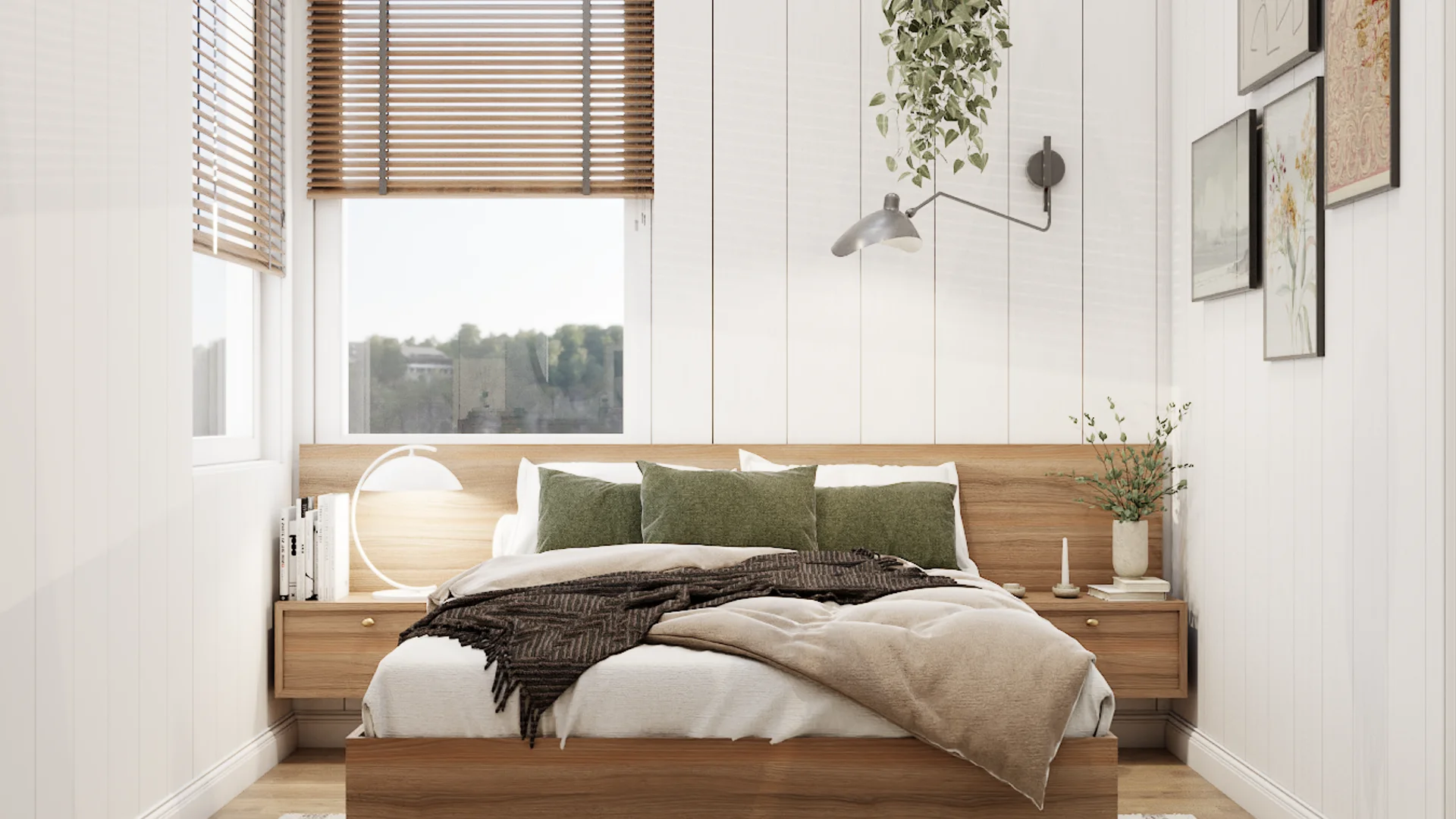 Bedroom with walnut platform bed, botanical gallery wall prints, and white shiplap walls