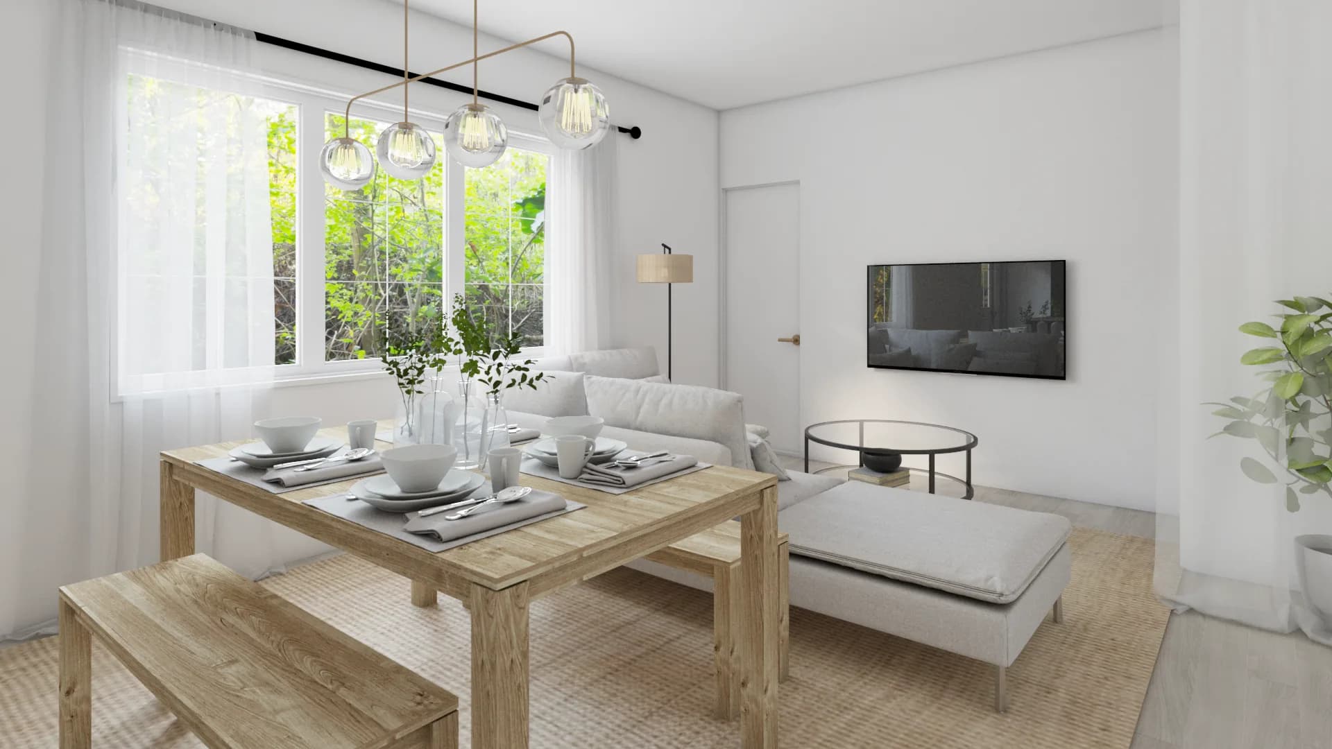 Bright open-plan Airbnb with pine farmhouse table, brass globe pendants, cream sofa, and jute rug