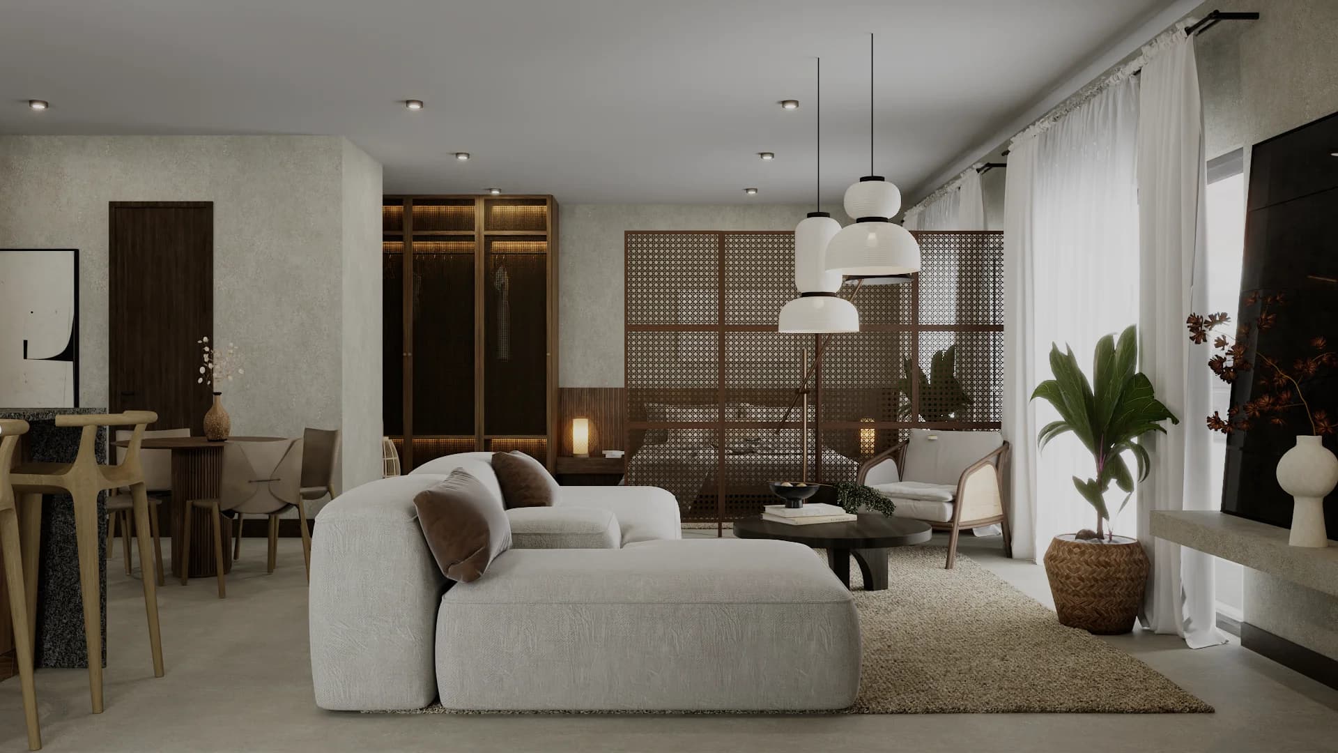 Open lounge with white sectional, wood screen divider, woven pendants, and dining peek.