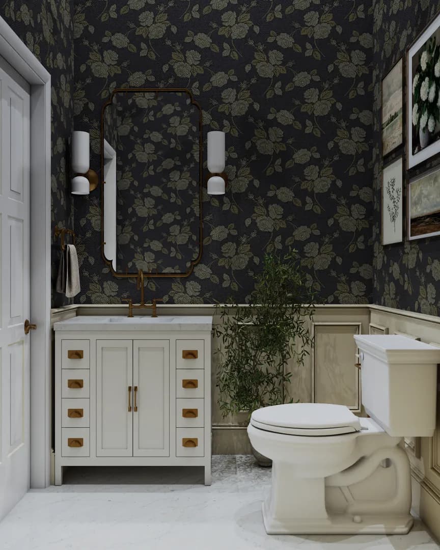 Powder room with dark botanical wallpaper, cream vanity with brass hardware, wainscoting, and marble floor