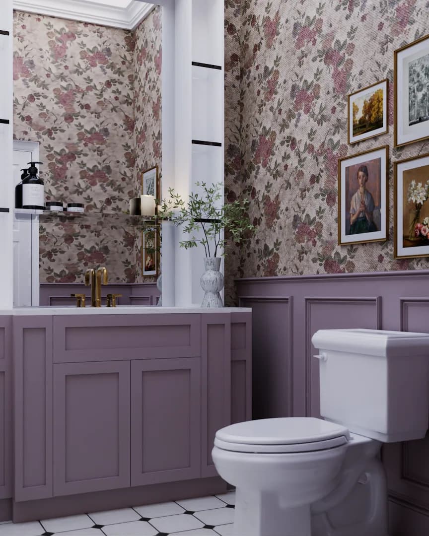 Powder room with mauve shaker vanity, rose floral wallpaper, gold gallery wall, and brass faucet