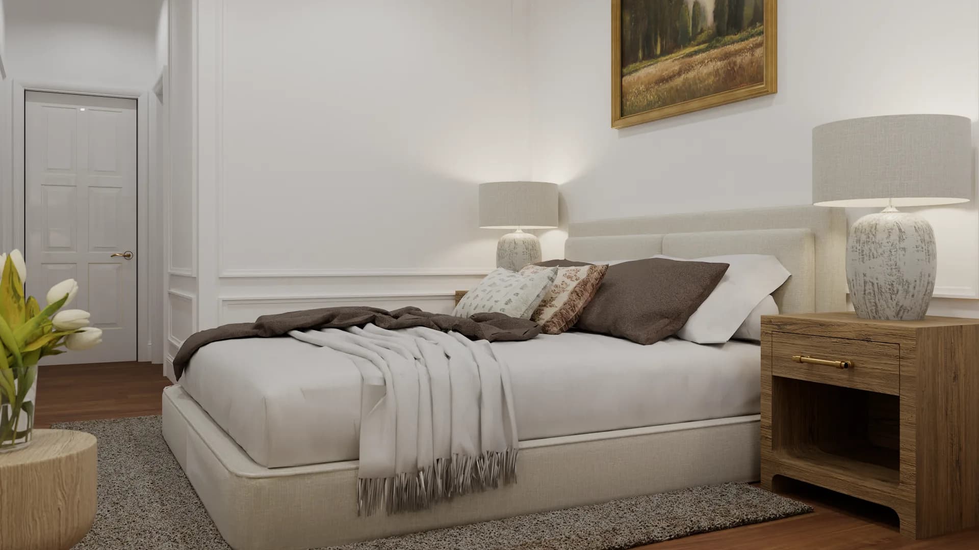 Cream bedroom side angle with gold-framed landscape and ceramic lamp