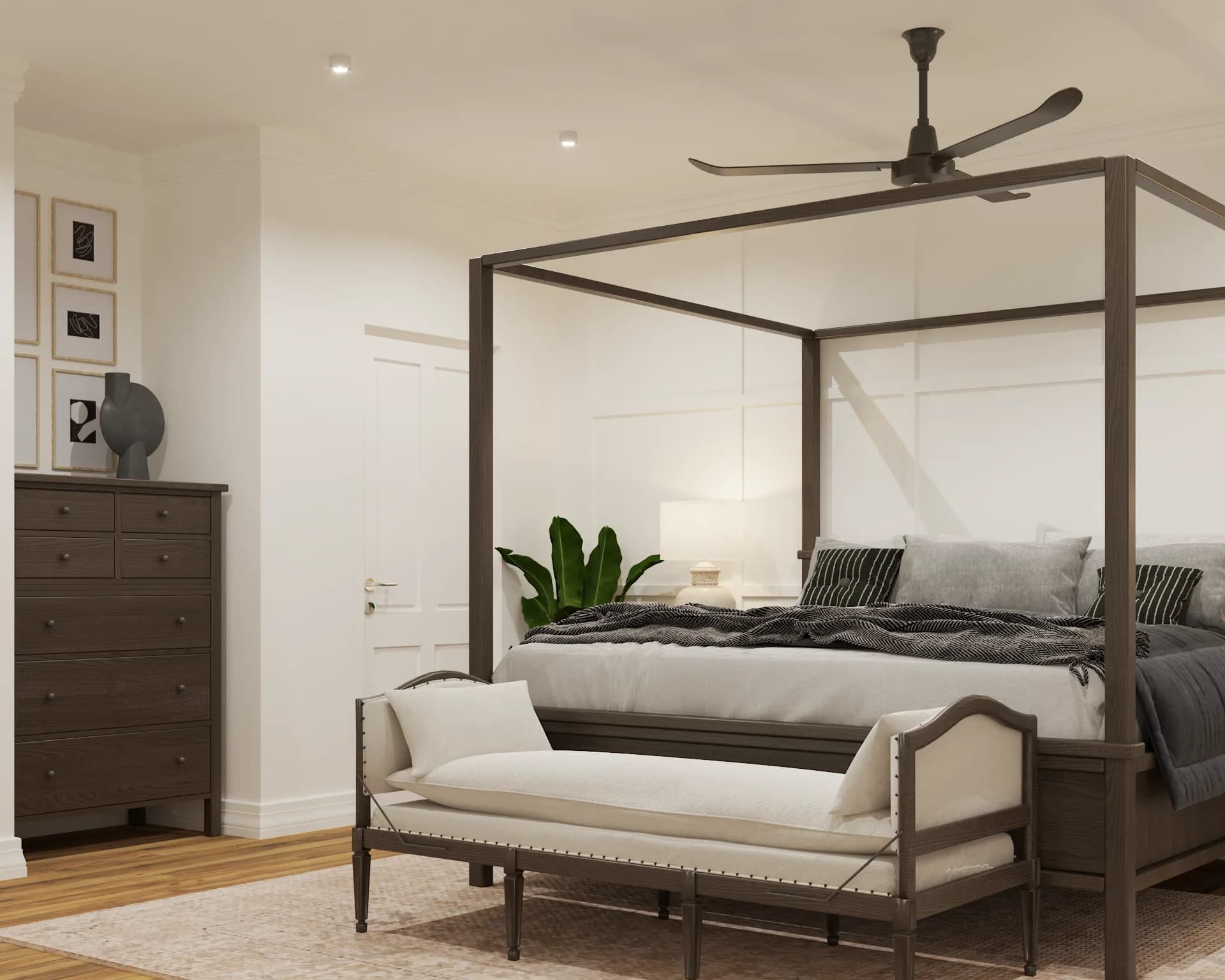 Dark dresser and canopy bed side angle with framed art and ceiling fan