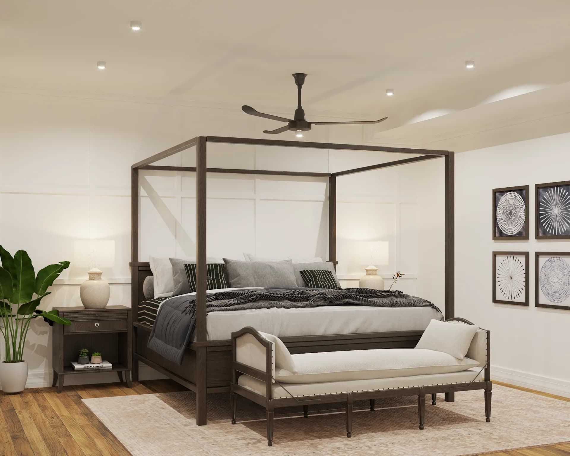 Dark walnut four-poster canopy bed with ceiling fan, linen bench, circular botanical art, and honey oak hardwood floors