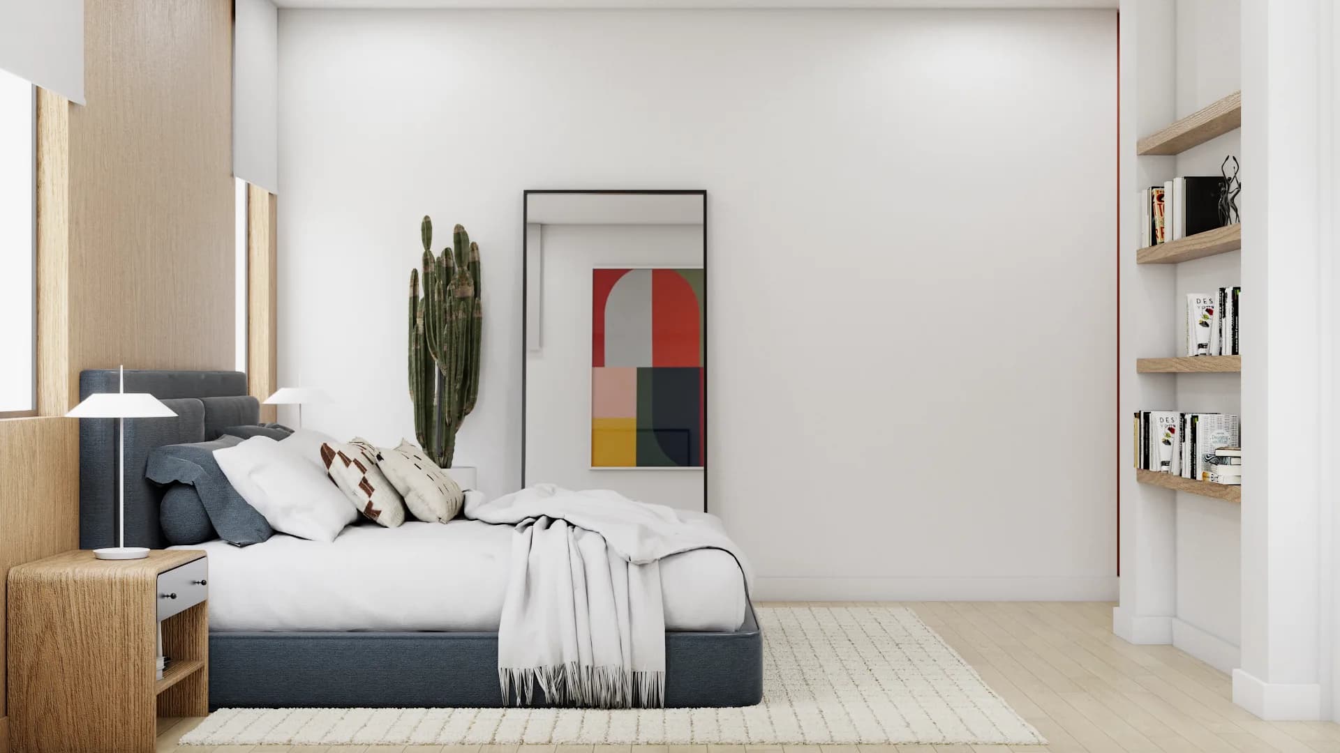 Side view showing open wall shelving with books, lean mirror, cactus, and abstract art