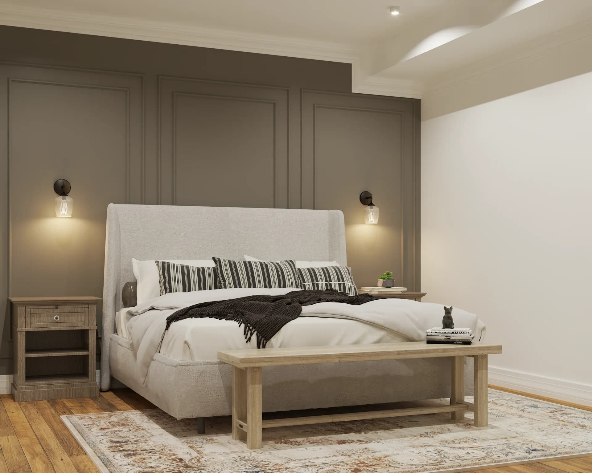 Bedroom with deep olive green paneled accent wall, tall linen headboard, globe wall sconces, oak nightstands, and striped pillows