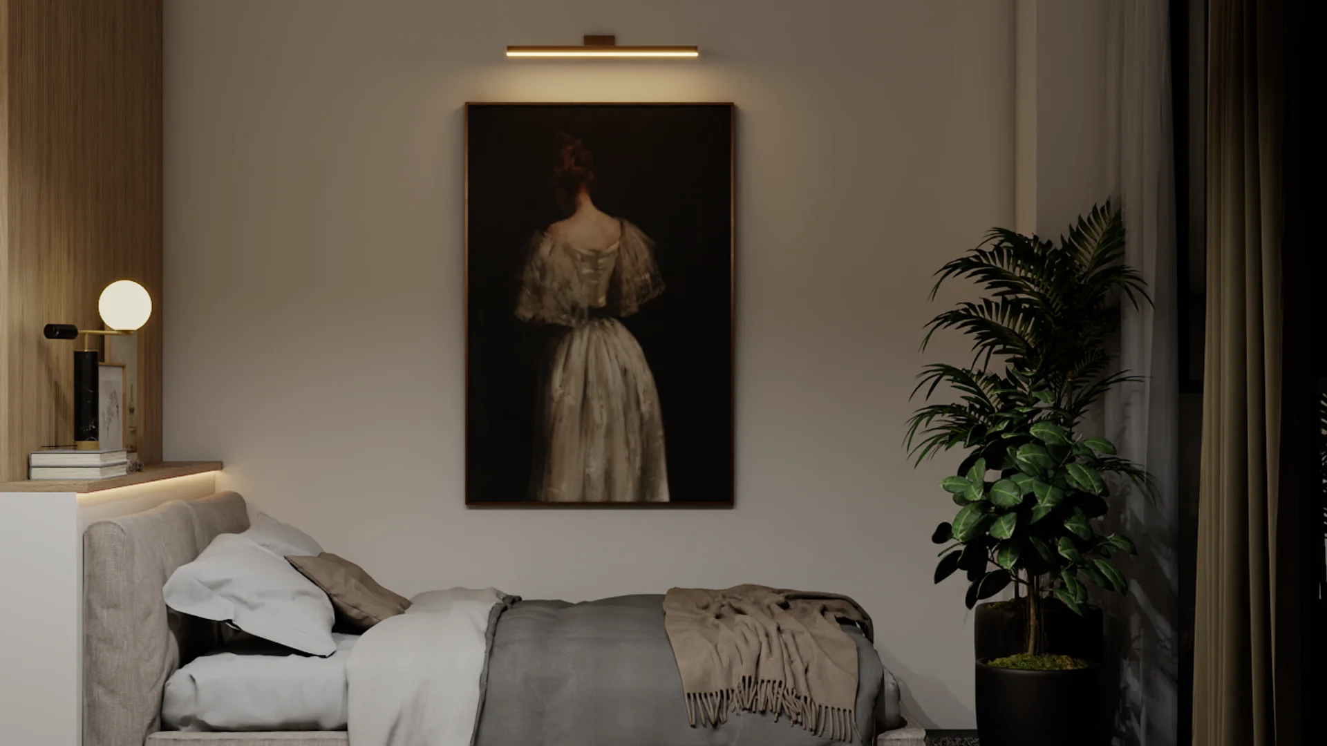 Daybed reading nook with brass picture light glowing on dark portrait painting and warm wall.