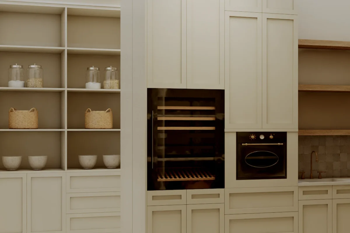 Cream shaker kitchen with built-in black glass wine cooler and brass wall oven integrated into tall cabinet column, open shelving with woven baskets and glass jars alongside