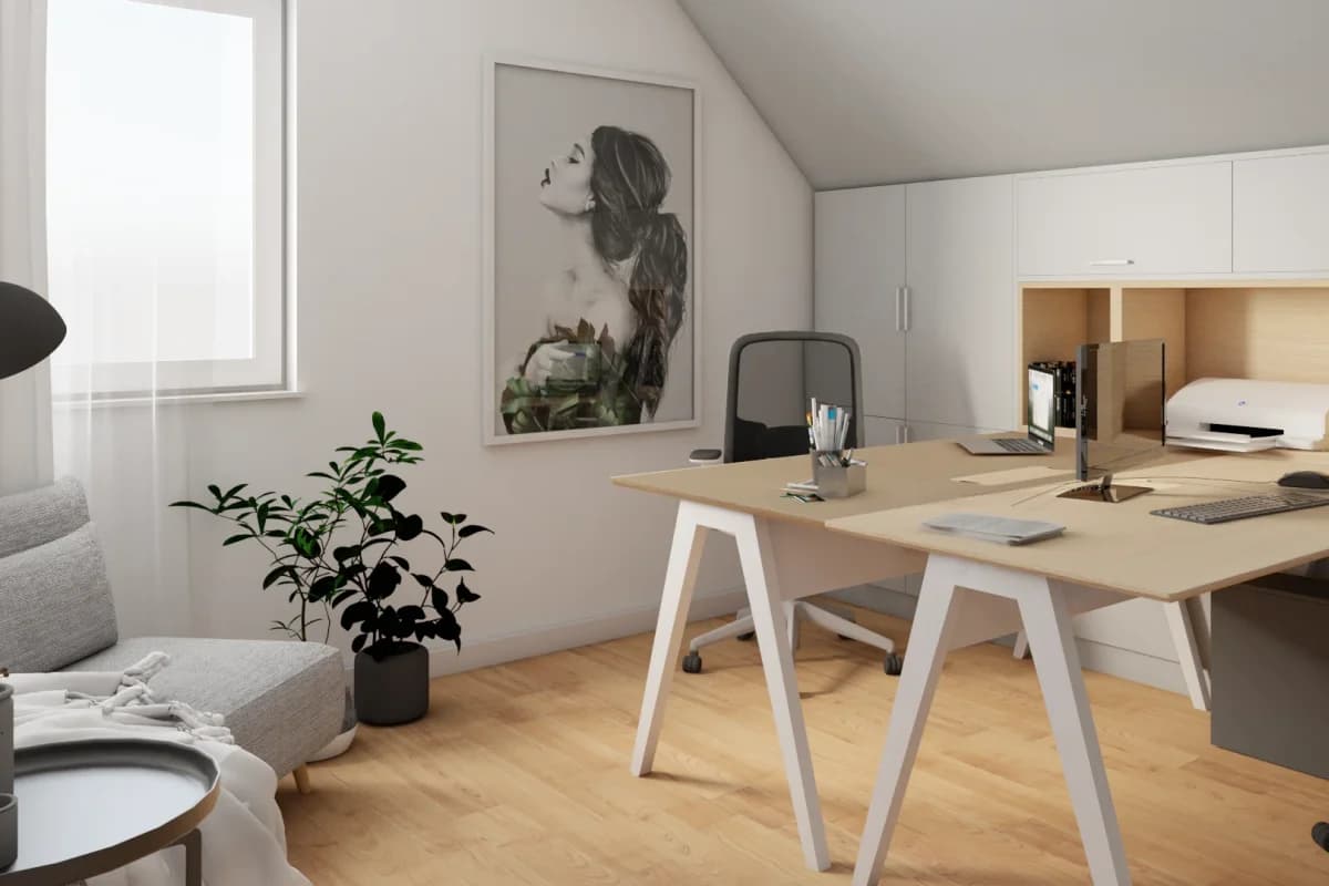 A-frame loft home office with light oak trestle desk, white built-in upper cabinets, open oak shelf nook, and portrait art on sloped white wall