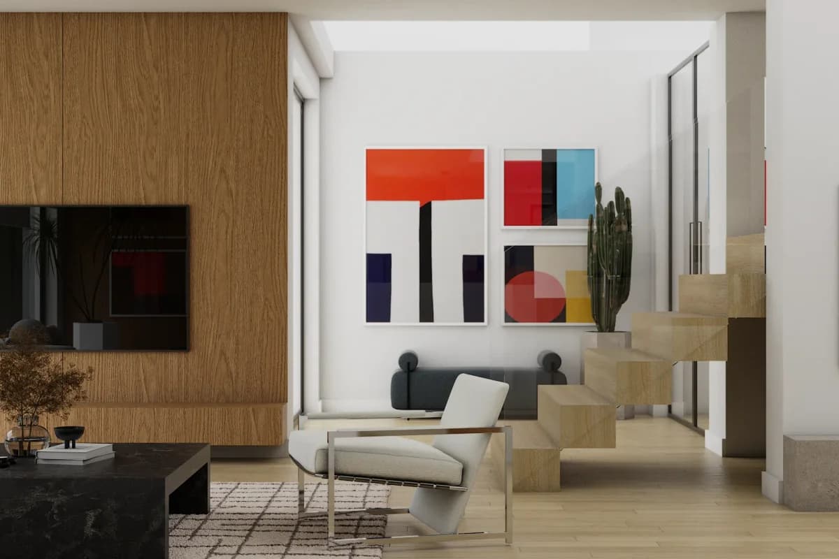 Contemporary living room with walnut wood panel TV wall beside a floating travertine staircase, geometric abstract art diptych, and wire-frame accent chair
