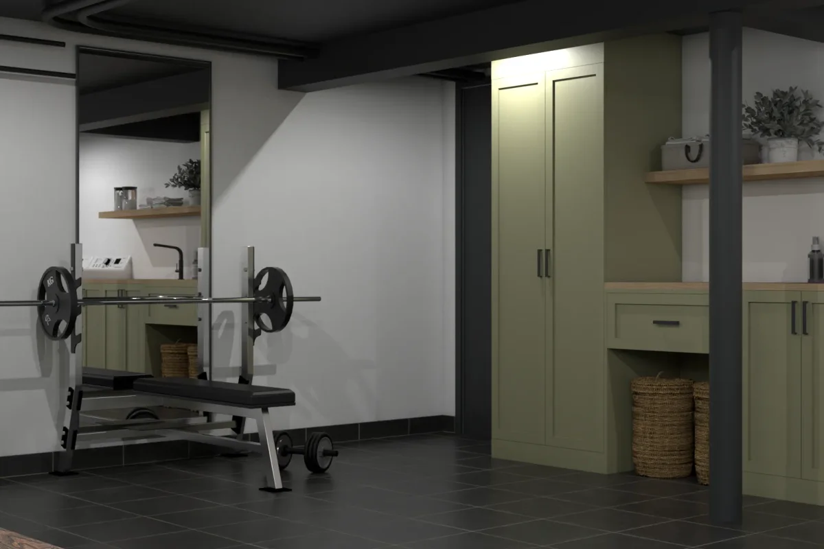 Sage shaker cabinets with butcher block counter, open shelves, woven baskets, and matte black hardware in a garage gym mudroom