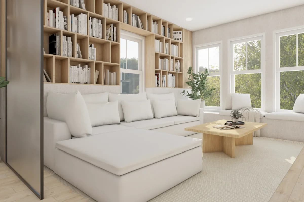 Minimalist living room with floor-to-ceiling oak grid bookshelf around windows, oversized white sectional sofa, and natural wood coffee table