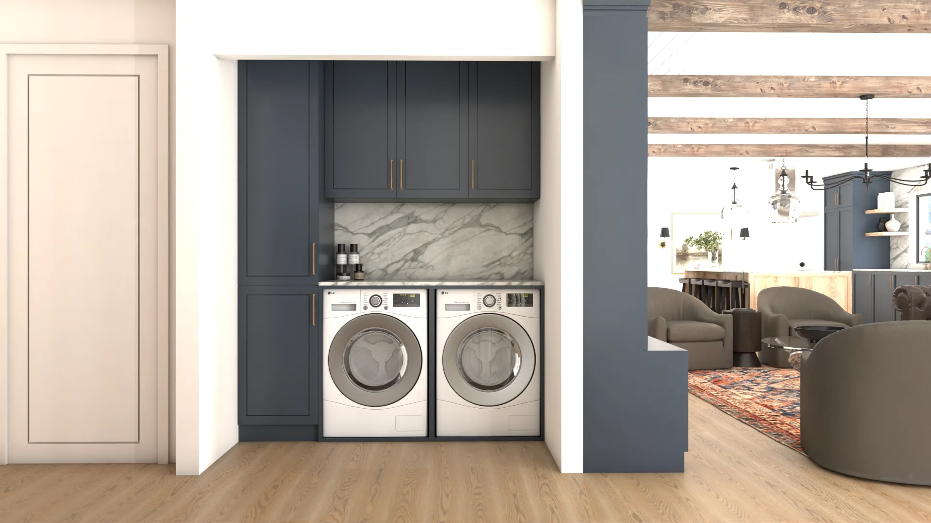 Navy shaker laundry nook with marble slab backsplash, brass pulls, and white front-load appliances