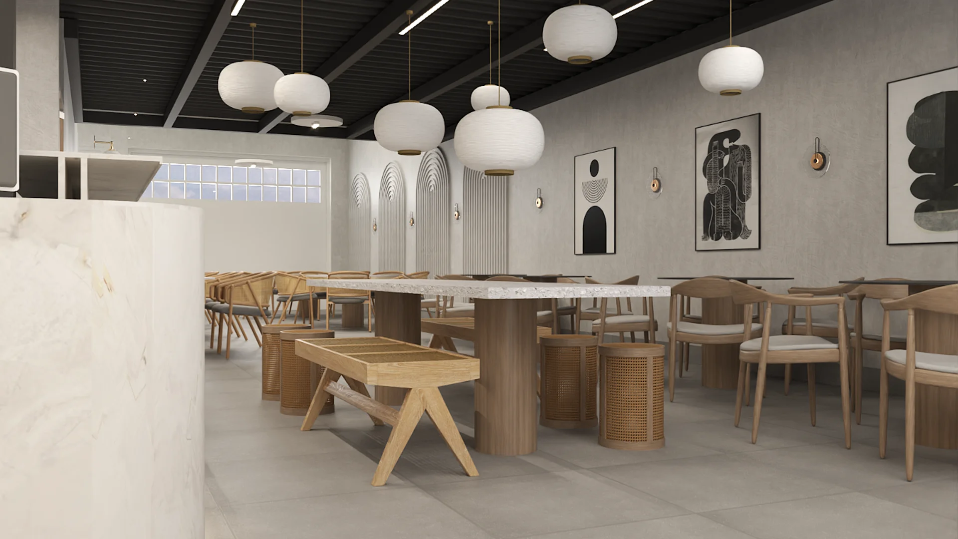 Cafe dining area with oversized globe pendants over terrazzo communal table, oak bench seating, rattan chairs, and monochrome art on plaster walls