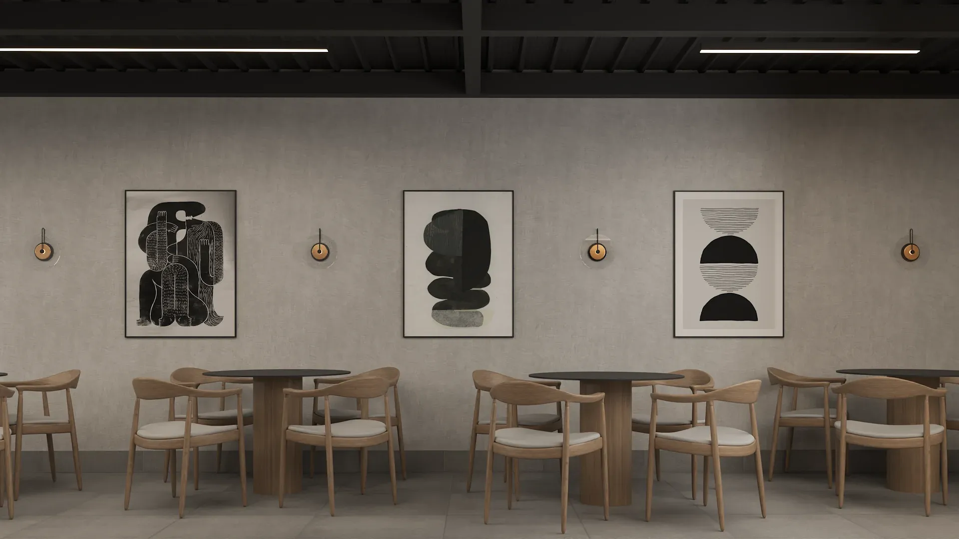Minimalist gallery-style cafe with smooth gray concrete walls, three large black-and-white abstract art prints in black frames, round dark wood pedestal tables, wishbone chairs with cream cushions, exposed black steel beam ceiling with linear LED strip lights, and brass wall sconces designed by Debora Interiors