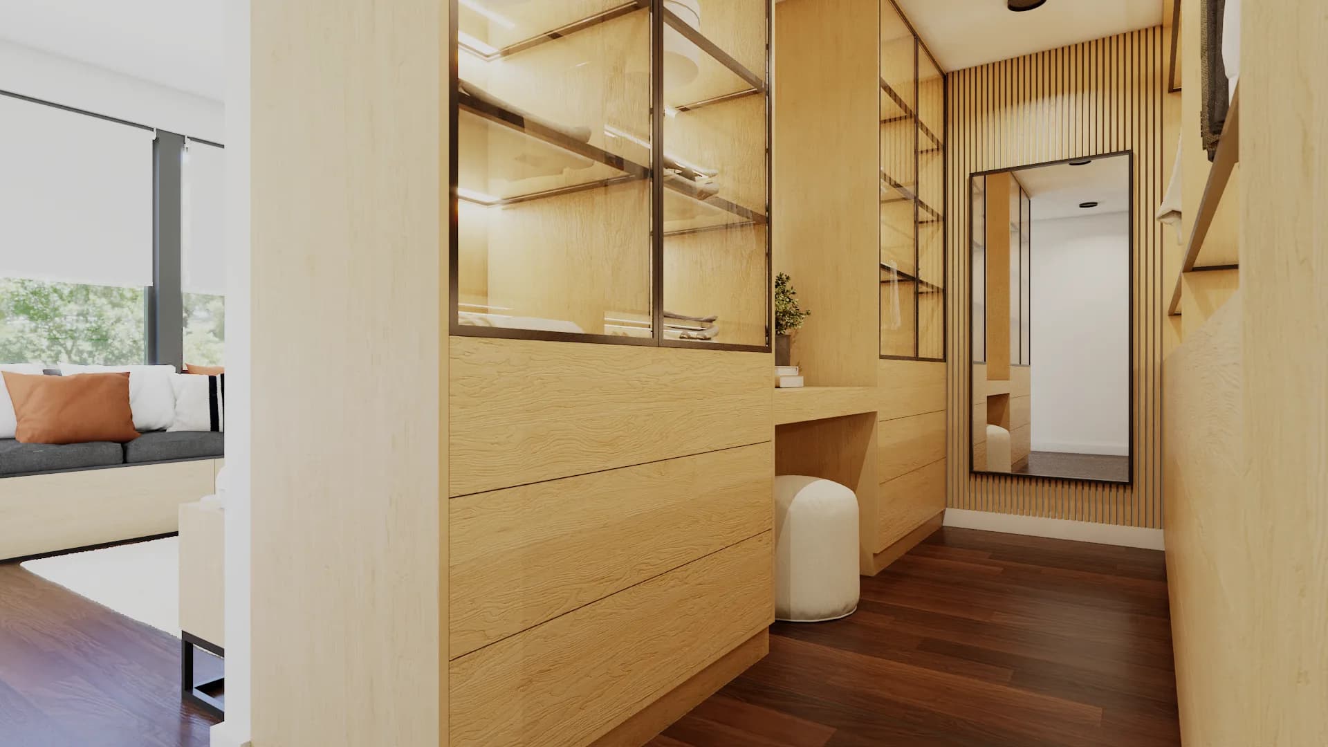 Side angle of oak dressing room corridor showing glass-front cabinets, drawer bank, white pouf, and
