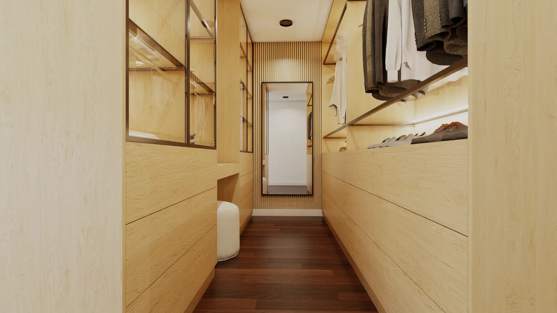 Narrow dressing room corridor view with oak cabinetry on both sides, oak slat wall panels, and full-