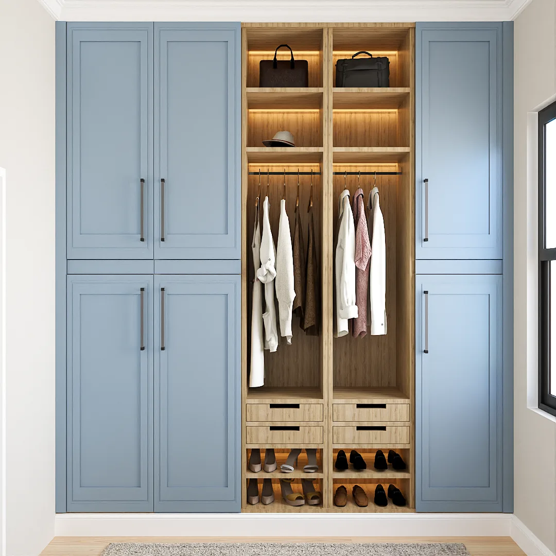 Floor-to-ceiling blue shaker closet cabinets with open oak interior, hanging clothes, LED lighting, and shoe cubbies