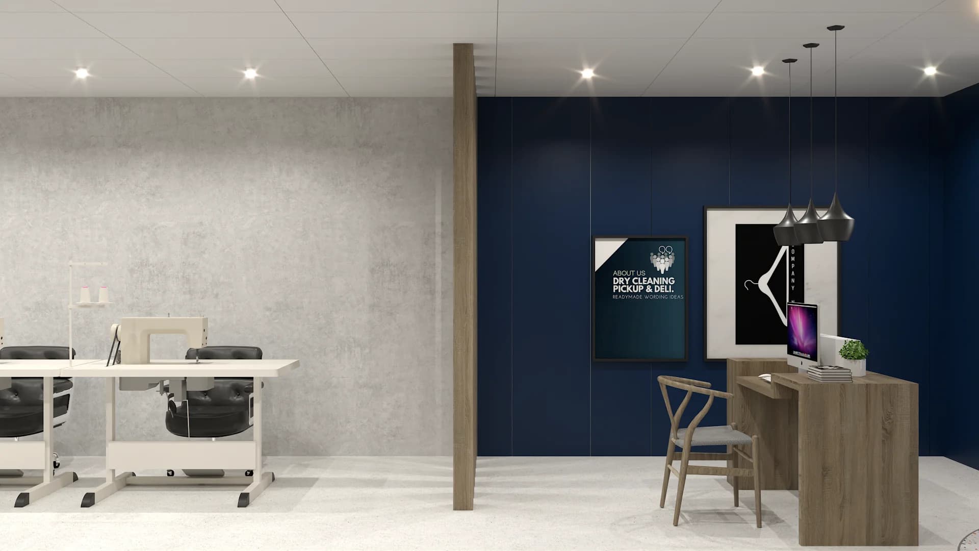 Manager workstation with oak desk and iMac against navy blue paneled wall with framed art posters