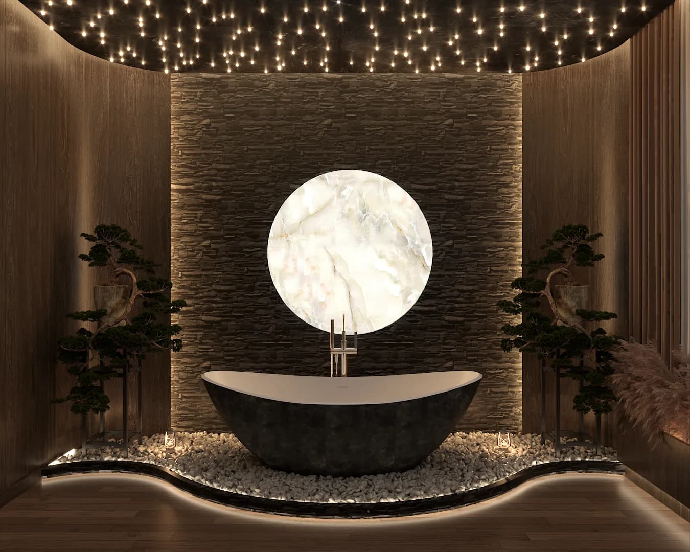 Black freestanding tub on white pebbles, backlit onyx moon disc on stacked stone wall, flanking bonsai