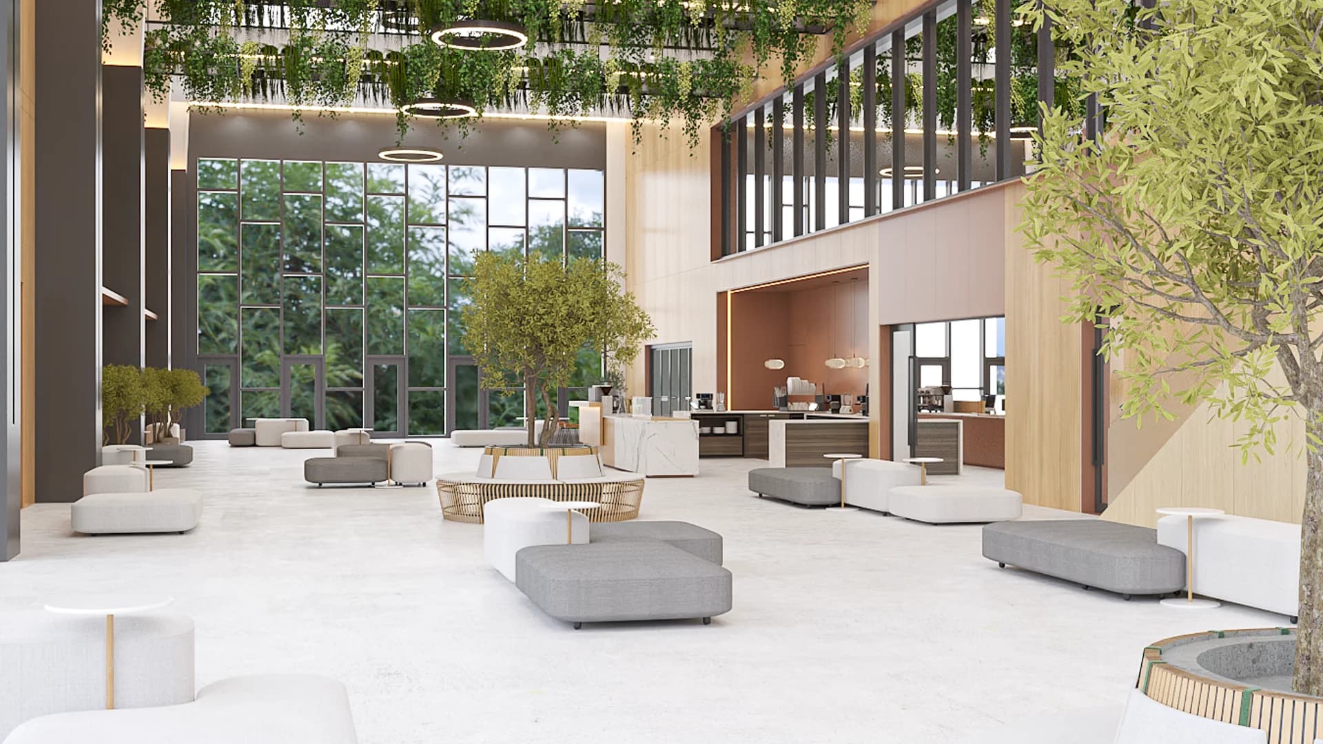 Double-height corporate lobby with hanging ceiling greenery, indoor olive trees, grey modular seating, and marble floors