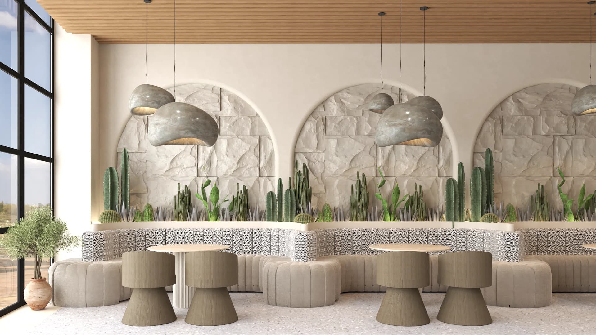 Stone arch wall niches with cactus gardens, cloud-shaped ceramic pendants, and banquette seating.