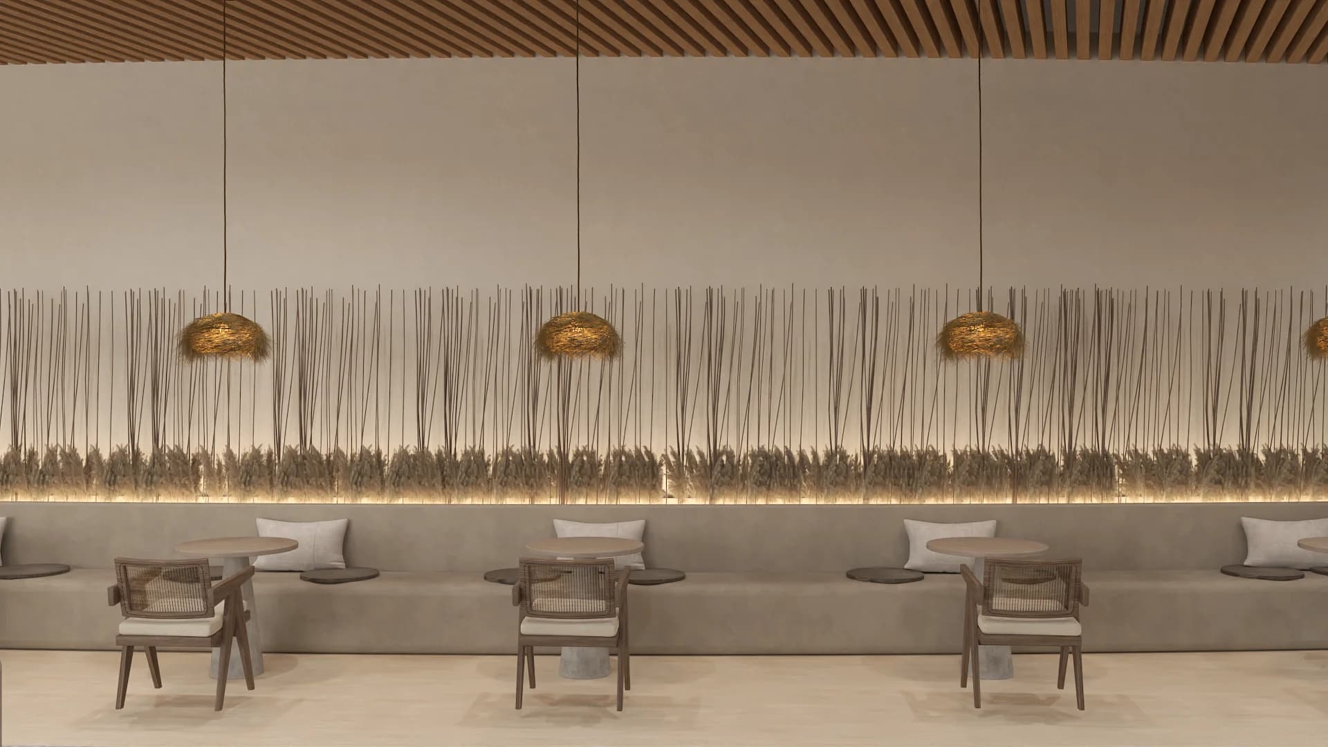 Lounge zone with wood-frame Papa chairs, sage cushions, and dried wheat installation wall.