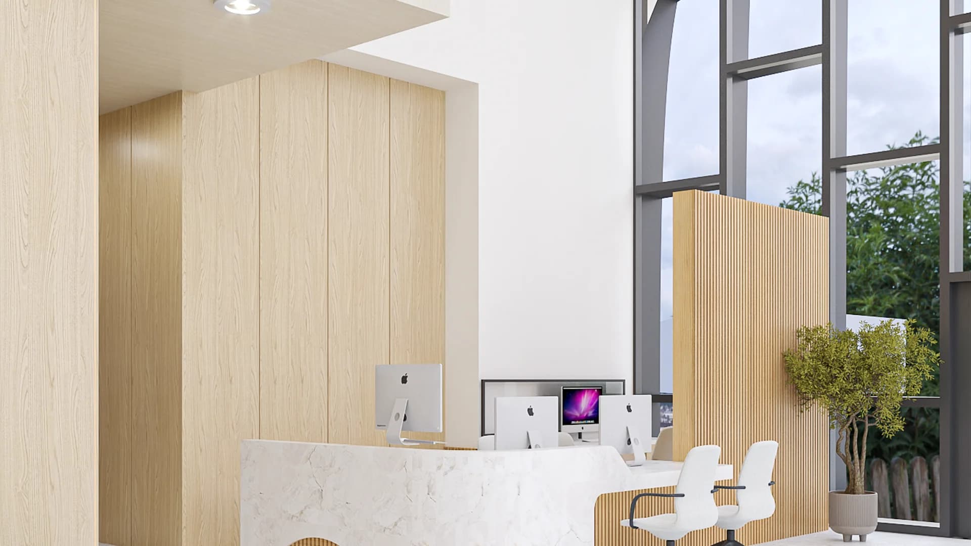 Corporate reception desk with white marble curved counter, light wood panels, and arched windows