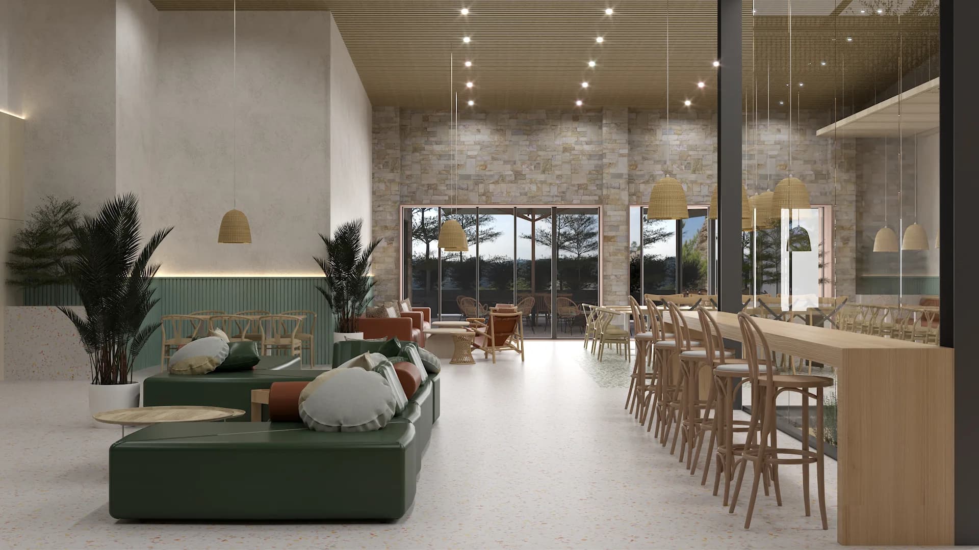 Open-plan cafeteria showing green lounge, cognac seating, and in-house coffee bar counter