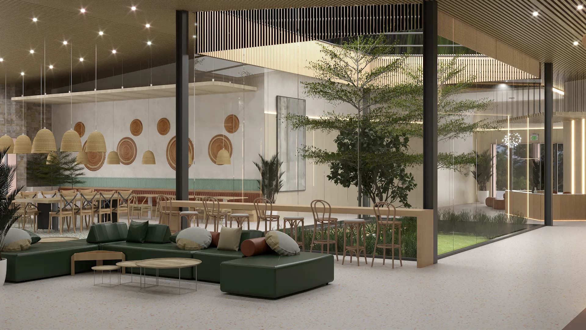 Wide view of campus cafeteria lounge with green modular sofa, rattan pendants, and dining zone beyond