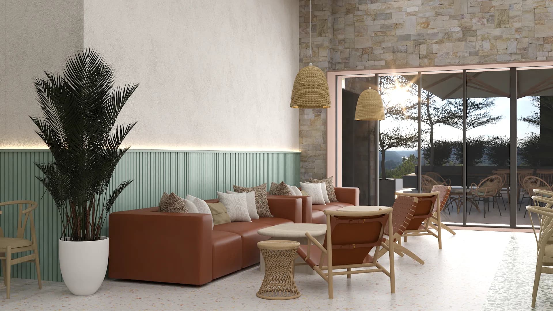 Cognac leather sofa and oak armchairs in employee lounge with sage fluted wainscoting