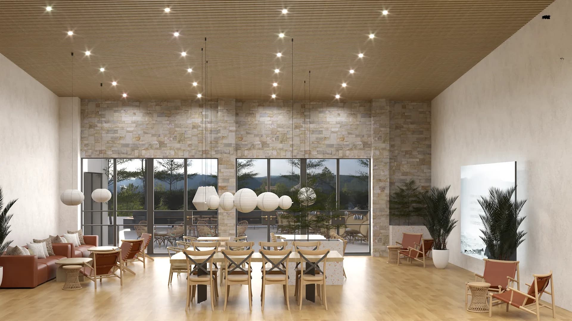 Full-width corporate dining and lounge with paper lanterns, oak floors, and stone wall