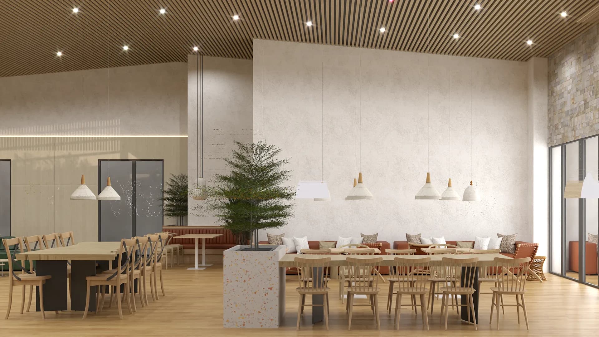 Terrazzo island divider with paper lantern pendants, wishbone chairs, and wood slat ceiling