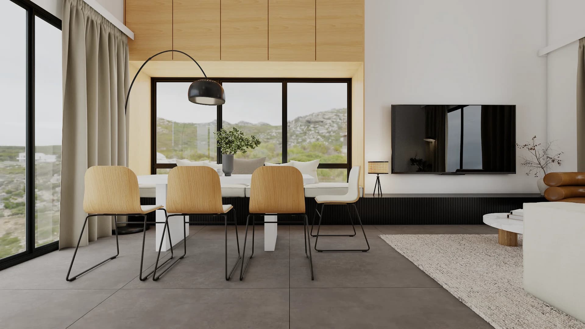 Open-plan dining area with blonde wood chairs, black arc lamp, and TV on slatted media console