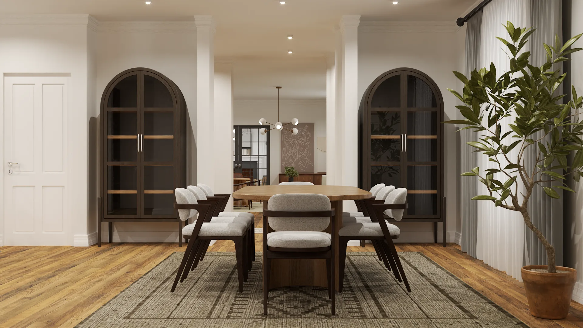 Full view showing paired arched cabinets flanking table with archway to adjoining room