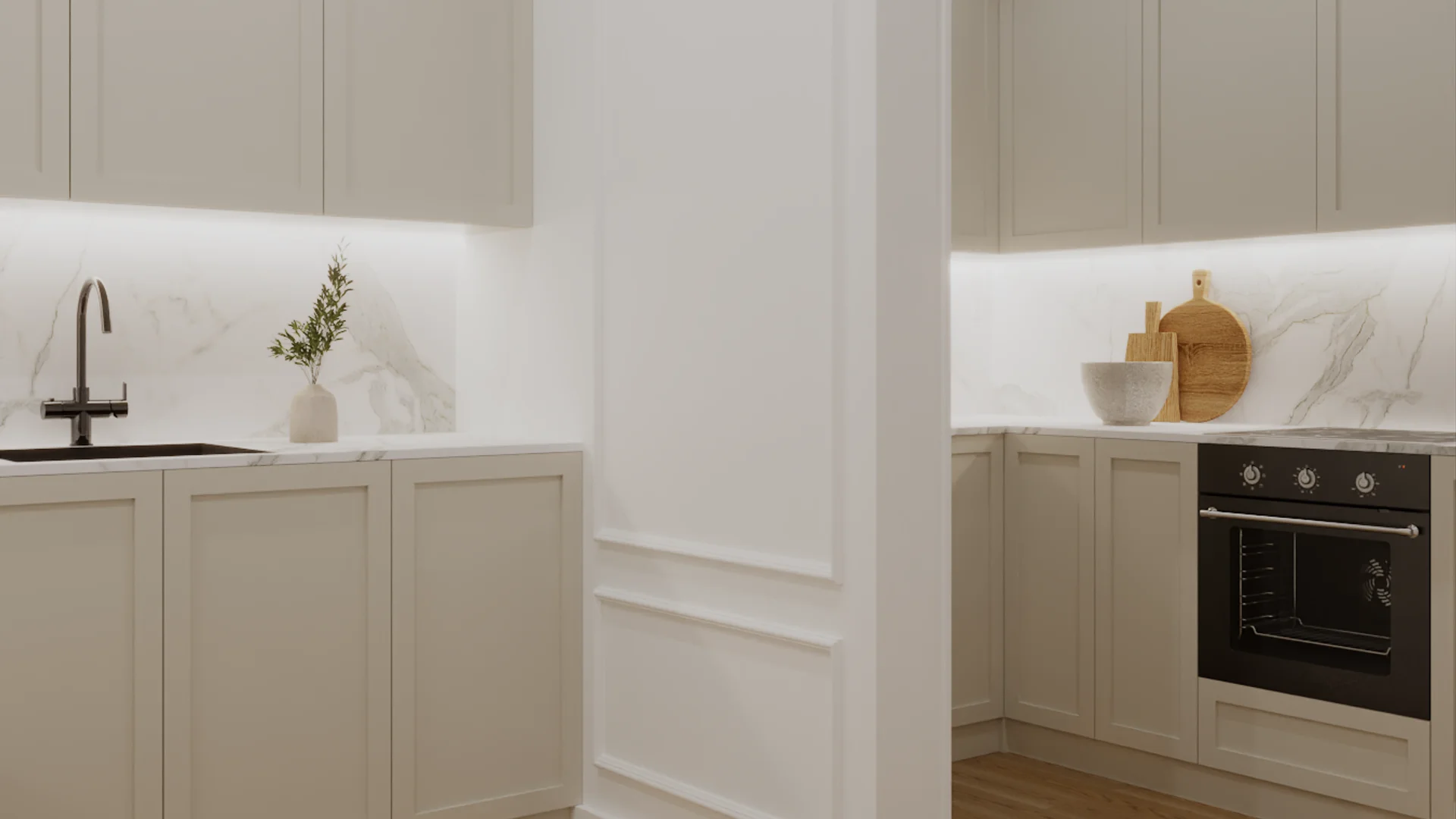 Cream shaker cabinets with marble backsplash, black undermount sink, and built-in black oven