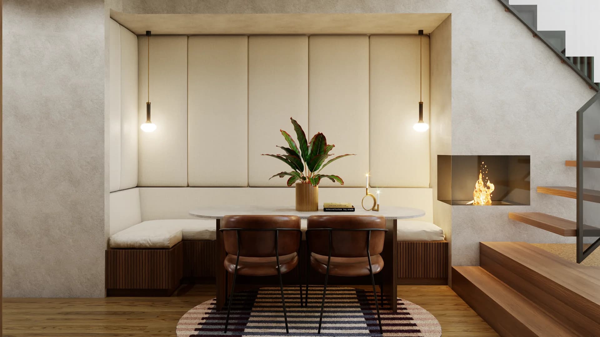Built-in dining nook with cream upholstered banquette and vertical panel wall, oval white marble table, two brown leather chairs, tropical plant centerpiece, dual pendant lights, wall-mounted fireplace, and open-riser wood staircase