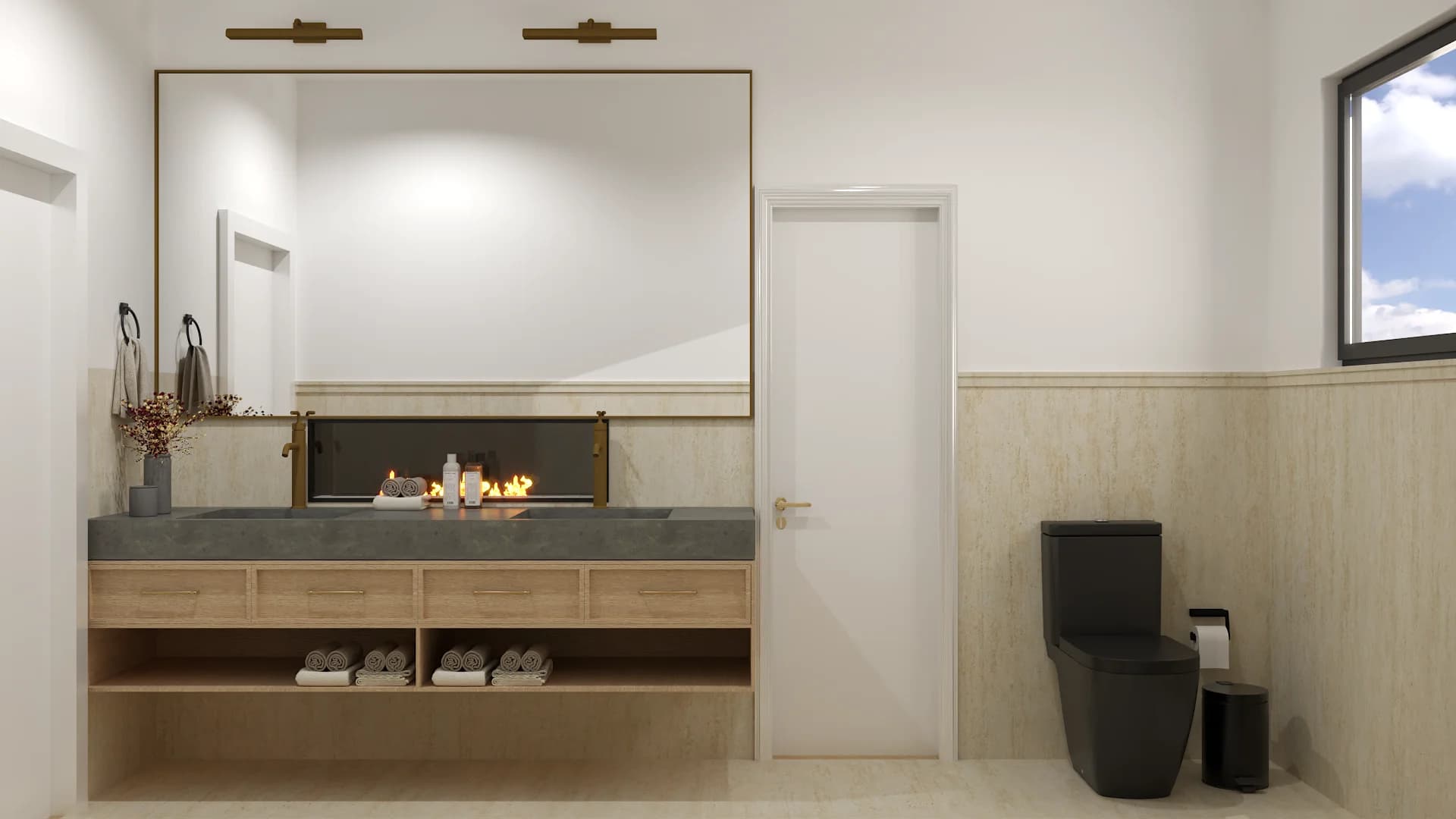 Bathroom with light wood vanity, large mirror, fire feature on stone counter, and travertine wainscoting