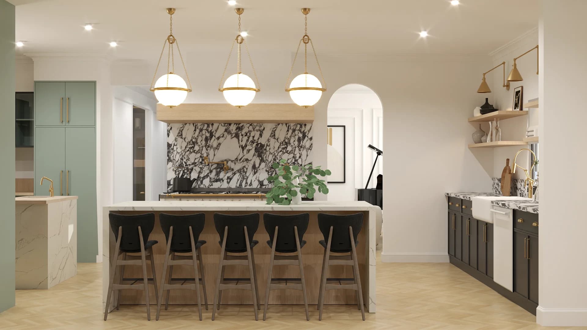 Light wood kitchen with marble waterfall island, three brass globe pendants, and floral marble splash