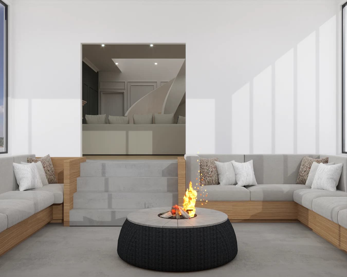 Sunroom with sunken fire pit, built-in banquette, and large mirror reflecting staircase beyond