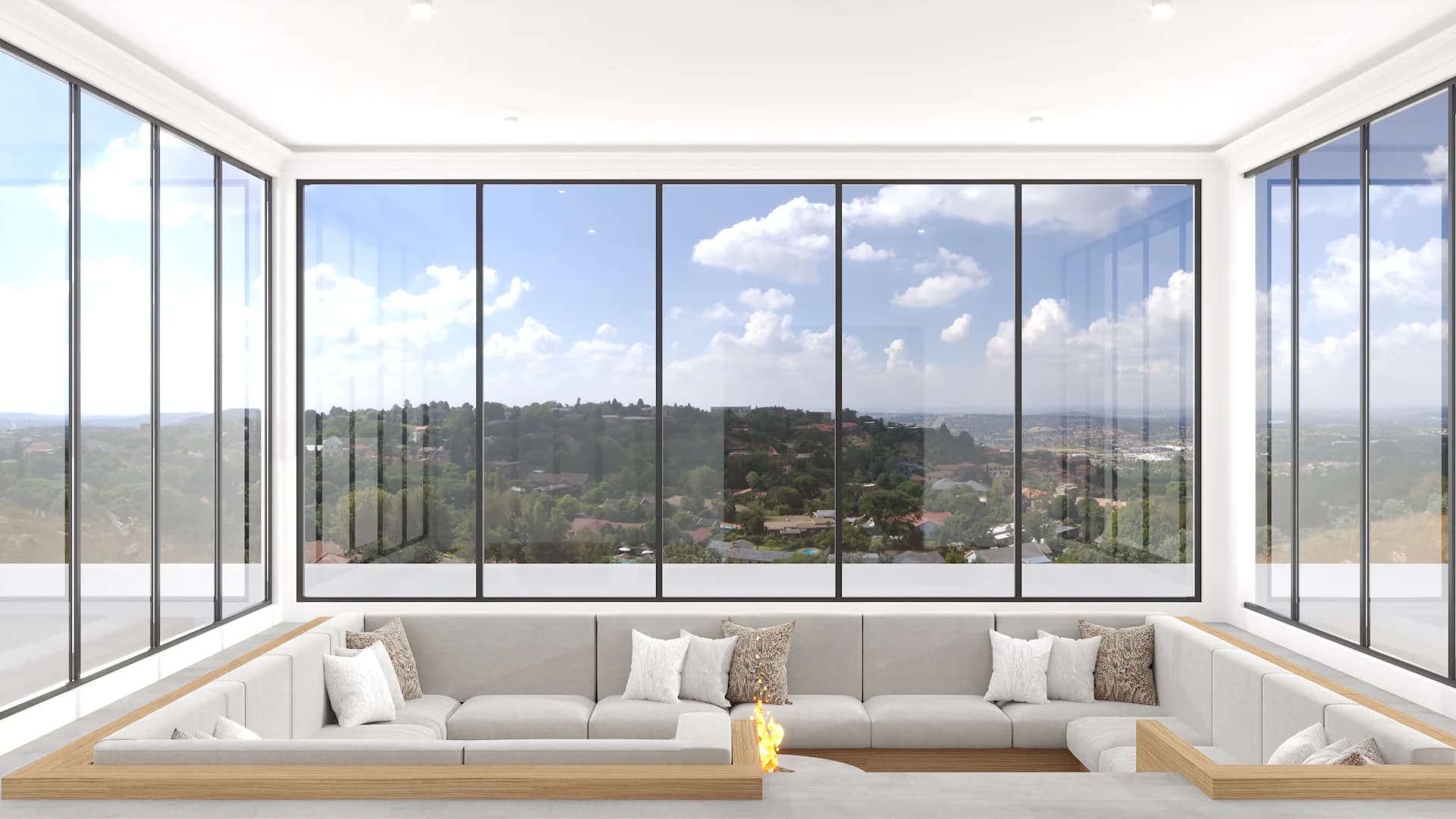 Sunroom with built-in white bench and mountain view through floor-to-ceiling windows on sunken patio